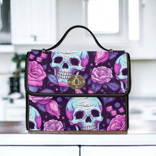 a purse with a skull and roses on it